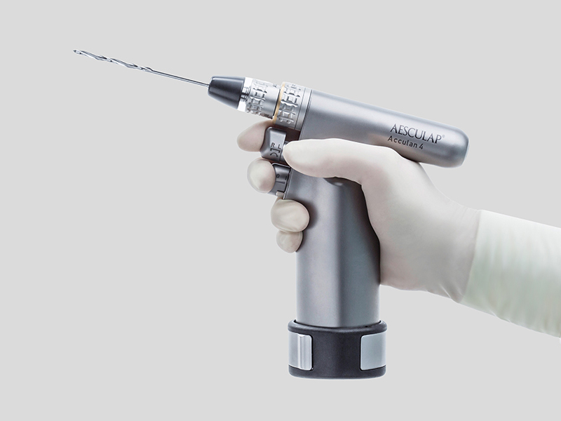 Eldivenli tek elle tutulan cerrahi güç sistemi